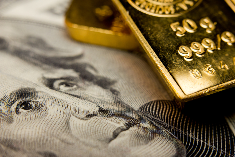 Money and gold closeup.